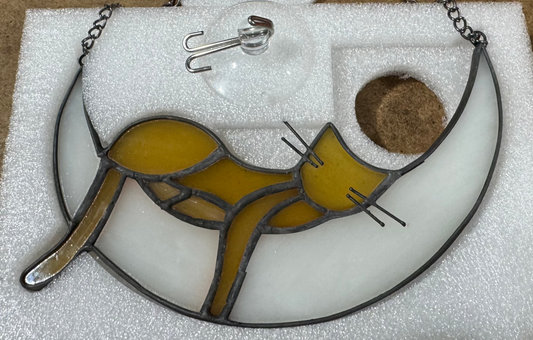 Sleeping cat on moon decoration with suction hook